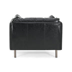 Fauteuil en similicuir, assise et dossier rembourrés, pieds en bois massif, touche décorative pour le salon