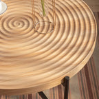 Table basse ronde au design moderne avec piètement en métal croisé