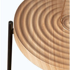 Table basse ronde au design moderne avec piètement en métal croisé
