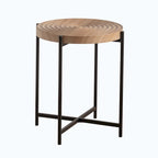 Table basse ronde au design moderne avec piètement en métal croisé